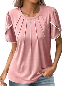 Detail view of pink pleated round neck top with white pom-pom lace sleeve trim