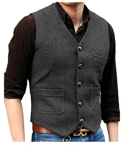 Detailed view of a grey herringbone tweed V-neck vest for groomsmen's wedding attire