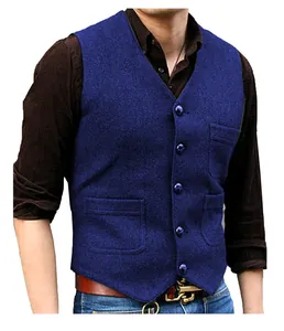 Close-up detail of men's blue herringbone tweed V-neck waistcoat showing buttons