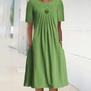 Green short sleeve crew neck pleated solid color midi dress with pockets for women