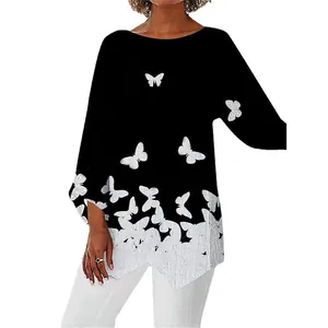 Élégante blouse à manches longues imprimé papillon noir et blanc avec un ourlet irrégulier