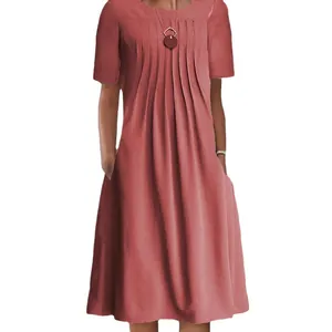 Casual women's short sleeve round neck pleated dress with pockets in elegant rose pink color