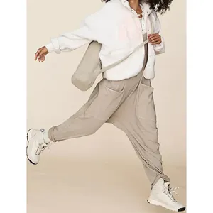 Stylish women's khaki harem bib overalls jumpsuit with pockets for casual outdoor wear