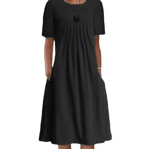 Front view of black short sleeve pleated midi dress with round neck and side pockets