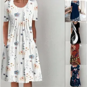 Women's floral print short sleeve dress with pockets in multiple stylish patterns.