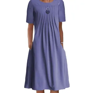 A purple solid color round neck short sleeve midi dress with front pleated details