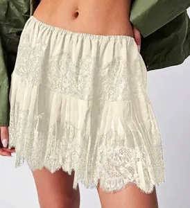 Minigonna in pizzo stile balletto bianco crema a vita alta con orlo asimmetrico per donna