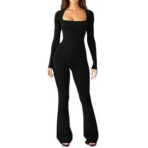 Full body view of a black long-sleeve jumpsuit featuring a square neck and flared leg cut