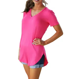 Detail view of women's bright pink V-neck short sleeve T-shirt with curved hem