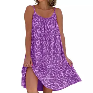 Abito estivo ampio a pois e fiori viola con spalline sottili per donne eleganti