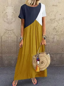 Geometrisches Color-Block-Maxikleid mit kurzen Ärmeln für den Sommerurlaub am Strand.