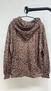 Detailed back view of a vintage oversized leopard print hoodie with adjustable drawstring hood