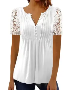 Detailed view of white blouse with lace sleeves, pintuck pleats, and button V-neckline.