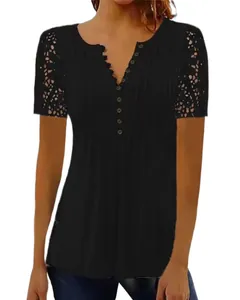 Detail view of the intricate lace crochet sleeves and pleated texture on a black T-shirt