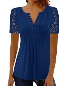 Detail showing lace floral sleeves and pleated V-neck with buttons on navy blue top