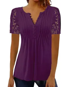 Close-up of a purple V-neck t-shirt featuring lace crochet sleeves and pleated details.