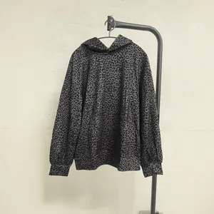 Oversized charcoal grey leopard print hooded sweatshirt with a vintage aesthetic look