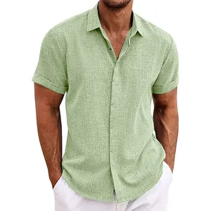 Detail view of a men's sage green linen short-sleeved button-down beach shirt