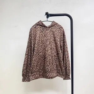 Vintage leopard print hooded sweatshirt with front pocket and loose fit for autumn style