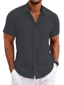 Detailed macro shot of men's dark grey short-sleeve linen shirt showing fabric texture