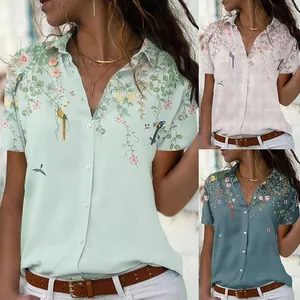 Camicia casual a maniche corte da donna con delicata stampa floreale e uccelli.