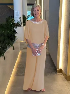 Elegant apricot sequin batwing sleeve top and matching wide-leg pants set for women