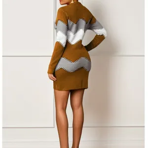 Back view of a women's long sleeve knitted bodycon dress with chevron pattern.