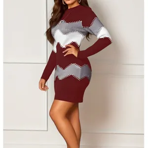 Detail of long sleeve bodycon knit dress with burgundy and grey chevron pattern