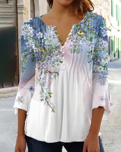 Elegant women's V-neck floral print blouse with buttons and delicate pleat details