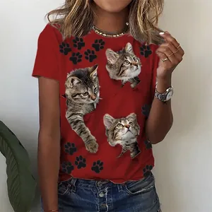 Close-up of a red round neck T-shirt featuring realistic 3D cat and paw prints