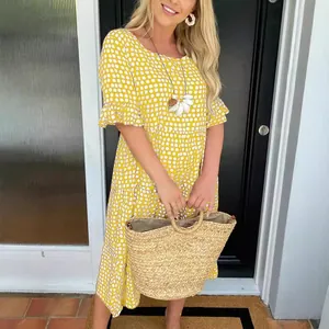 Summer yellow round neck dress with white polka dots and stylish ruffle sleeves