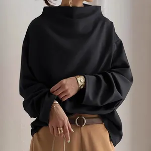Elegant black funnel neck loose casual long-sleeved top for women in minimalist style