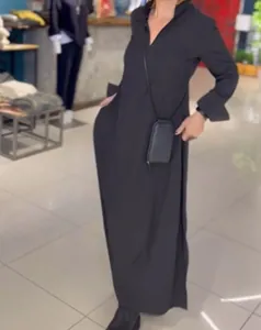 Elegant women's casual solid black V-neck long sleeve maxi dress for autumn and winter