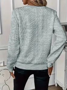 Back view of a women's light grey casual cable-knit textured pullover sweatshirt