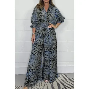 Stylish blue leopard print wide-leg jumpsuit with V-neck and cinched waist for women.