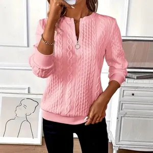 Stylish women's pink cable-knit zipper pullover sweatshirt with textured quilted design