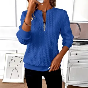 Long sleeve women's blue textured pullover sweatshirt with half zipper and cable pattern