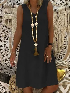 Elegant black sleeveless V-neck summer tank dress for women in a boho lifestyle setting