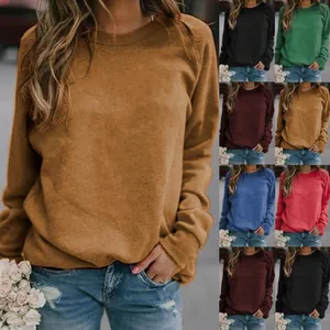 Detailed view of women's long-sleeve crewneck sweatshirt available in many colors.