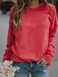Detailed view of women's vibrant red crew neck long-sleeve top for casual wear