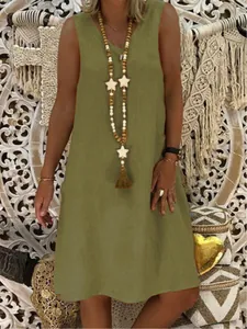 Macro detail view of a women's olive green V-neck sleeveless summer tank dress
