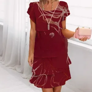 Elegant wine red tiered chiffon dress featuring abstract patterns and a classic crew neck design