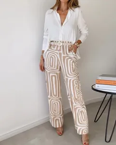 Casual two-piece set with white long-sleeve shirt and geometric print wide-leg pants