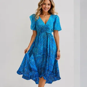 Detailed view of blue feather pattern on a loose casual V-neck floral summer midi dress