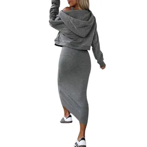 Grey two-piece outfit featuring a hooded crop sweatshirt and a slim fit maxi dress