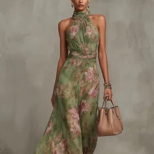 Elegant green floral print halter neck mesh maxi dress with pleated waist detailing