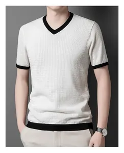 Macro view of white waffle knit texture with contrast black V-neck ribbing detail
