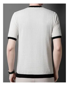 Back view detail of a men's white waffle knit short sleeve shirt with black ribbed trim