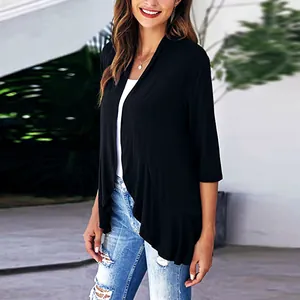 Women's elegant black knit cardigan with 3/4 sleeves and stylish ruffled hem detail