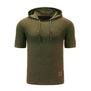Detailed view of olive green men's hooded knit t-shirt with a premium jacquard texture
